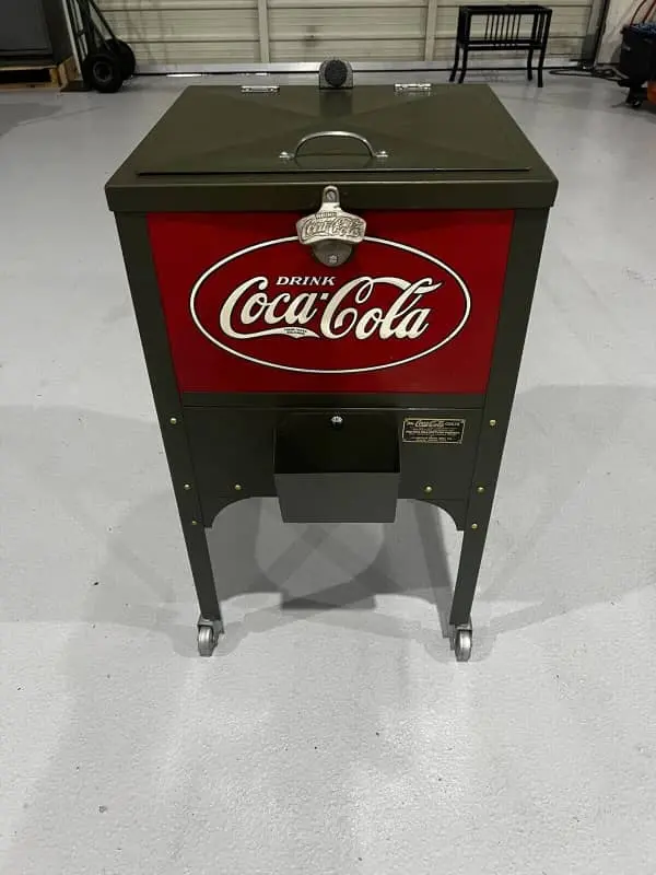Vintage-style Coke coolers on wheels are designed to resemble the iconic coolers from the past